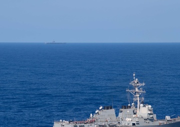 The guided-missile destroyer USS Winston Churchill (DDG 81) stands by for a refeuling-at-sea