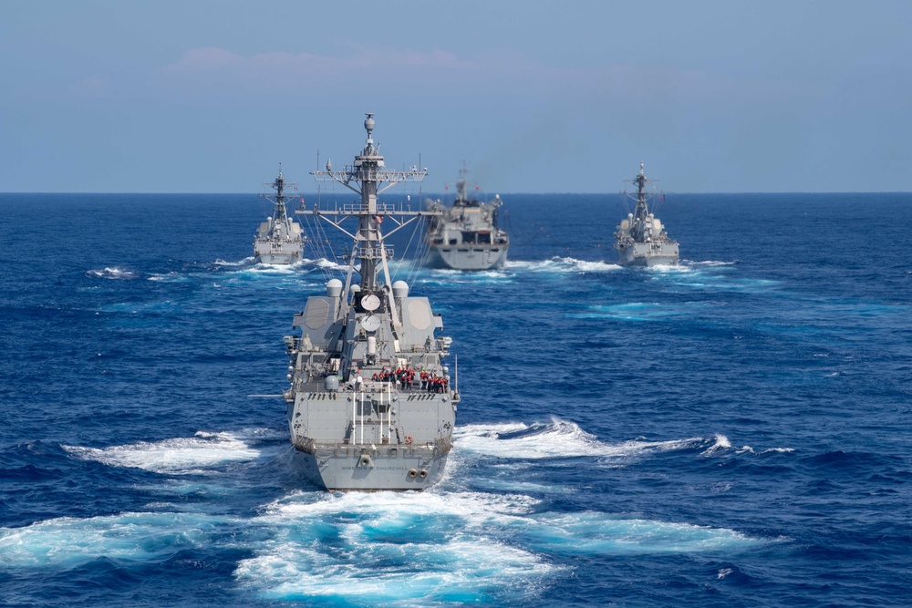 U.S. Navy ships conduct a refeuling-at-sea