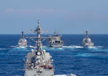 U.S. Navy ships conduct a refeuling-at-sea