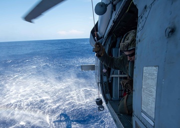 U.S. Navy ships conduct a refeuling-at-sea