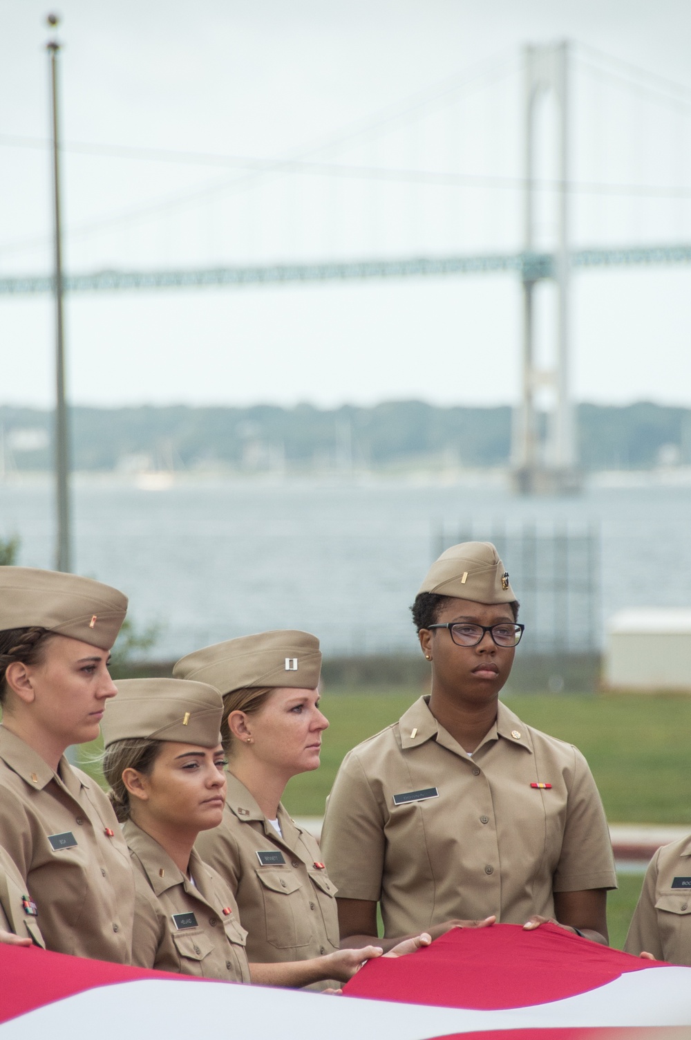190911-N-TE695-0017 NEWPORT, R.I. (Sept. 11, 2019) — Graduating class 19060 of Officer Development School (ODS) at Officer Training Command, Newport, Rhode Island, conducts a flag ceremony in remembrance of the 9/11 attacks on Sept. 11, 2019.