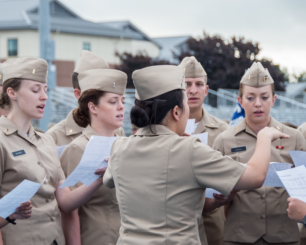 190911-N-TE695-0023 NEWPORT, R.I. (Sept. 11, 2019) – Officer Development School chorus sings Amazing Grace