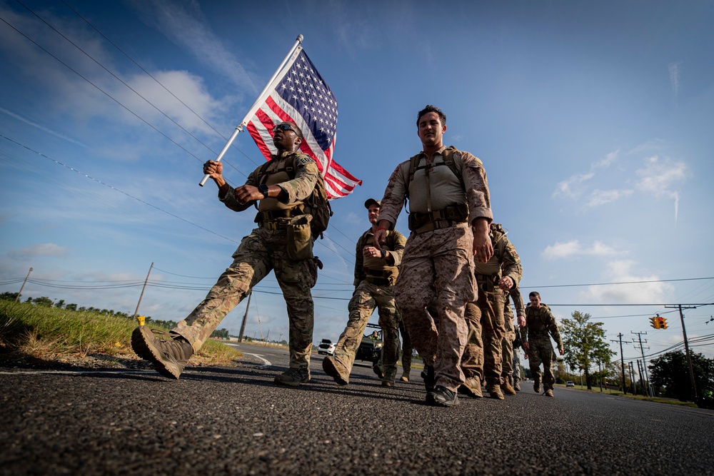 Service members march in remembrance