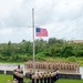 Sailors observe colors during 9/11 remembrance ceremony.