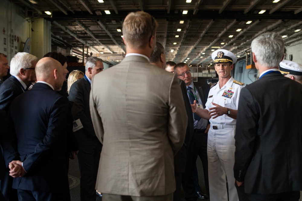 Distinguished visitors tour the aircraft carrier USS John C. Stennis (CVN 74)