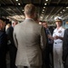 Distinguished visitors tour the aircraft carrier USS John C. Stennis (CVN 74)