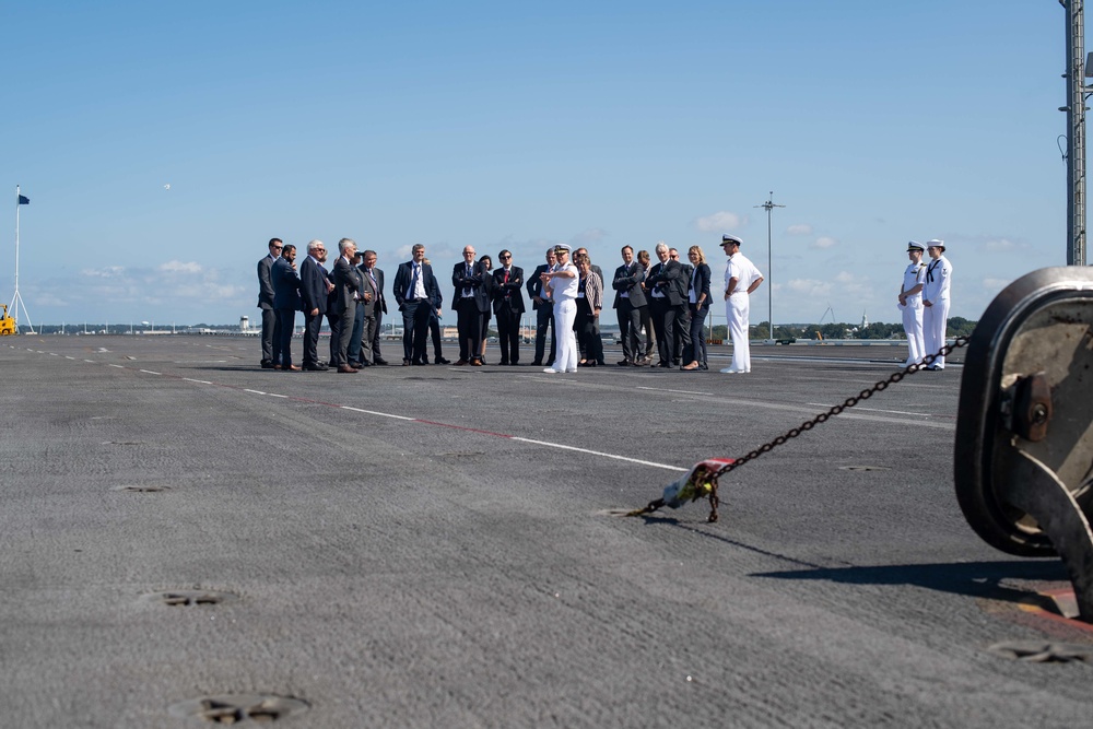 Distinguished visitors tour the aircraft carrier USS John C. Stennis (CVN 74)