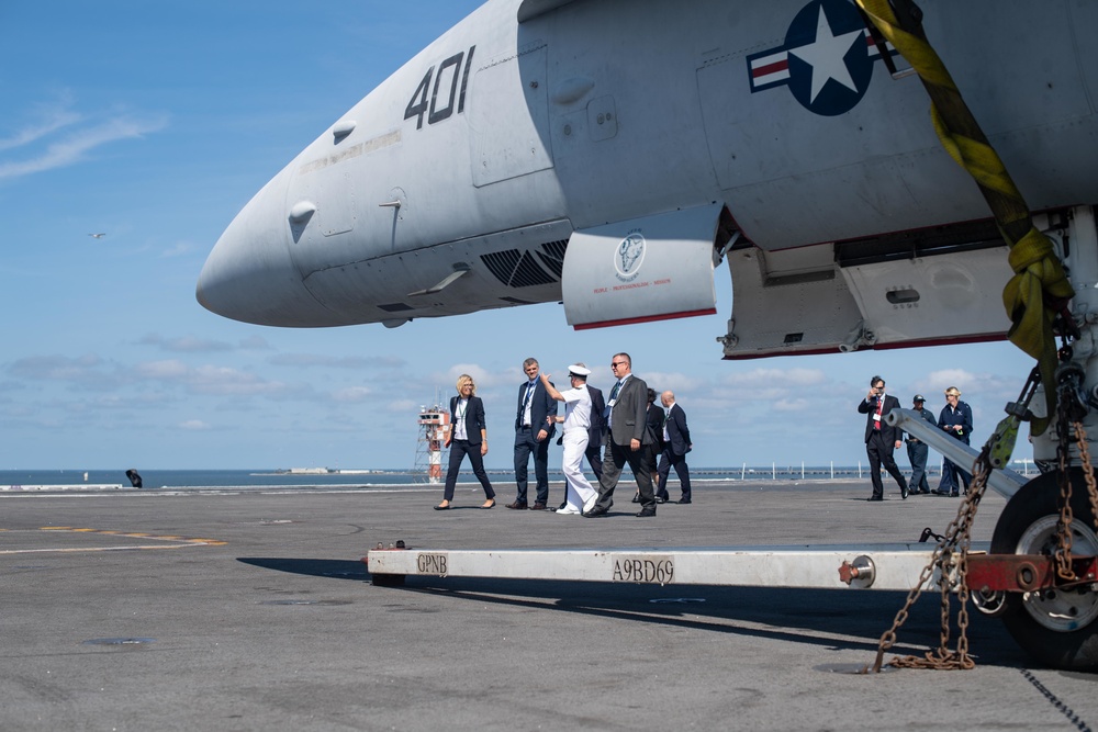 Distinguished visitors tour the aircraft carrier USS John C. Stennis (CVN 74)