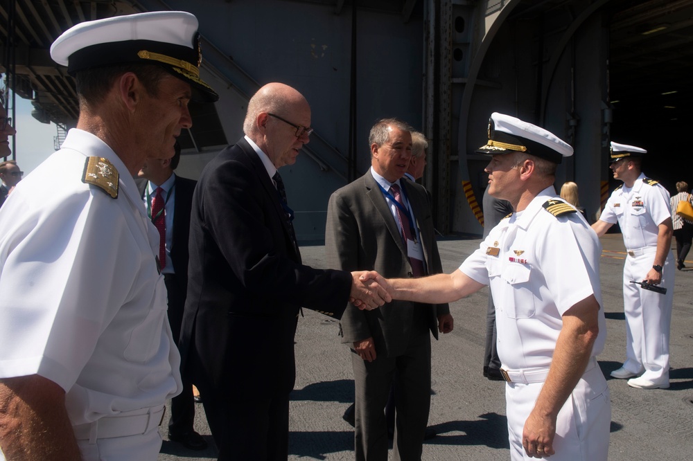 Capt. Randy Peck greets distinguished visitor