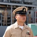 Chief Petty Officer Pua Xiong aboard Avenger-class mine countermeasures ship USS Pioneer (MCM 9), just pinned as a Chief Petty Officer, stands at attention.