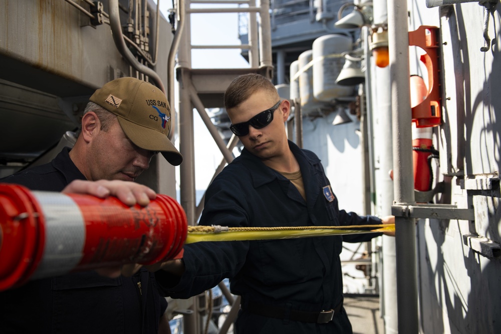 Sailors Conduct a Spot Check Aboard USS San Jacinto