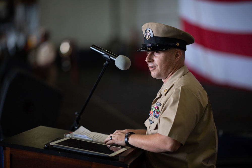 U.S. Navy Command Master Chief Benjamin Rushing, from Waterloo, Iowa, addresses Chief Selects during a CPO pinning ceremony