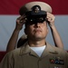 U.S. Navy Chief Aviation Boatswain's Mate (equipment) Ernesto Arellano receives his chief petty officer (CPO) combination cover during a CPO pinning ceremony