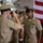 U.S. Navy Command Master Chief salutes Chief Personnel Specialist