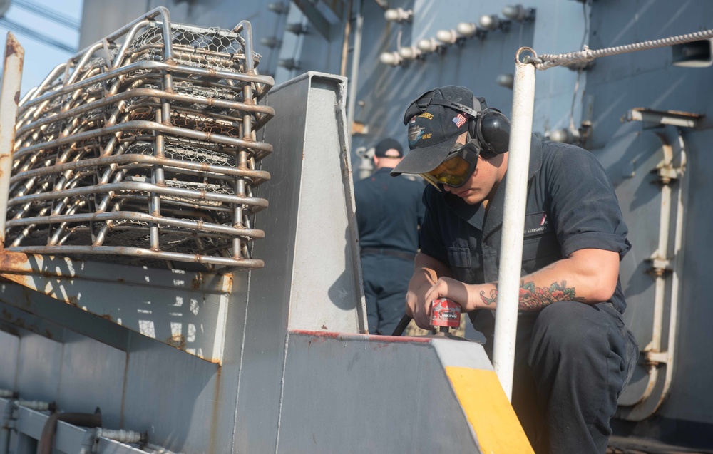 U.S. Sailor conduct preventive-corrosion maintenace