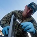 U.S. Sailors conducts preventive-corrosion maintenance