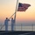 U.S. Sailors observe evening colors U.S. Sailors observe evening colors
