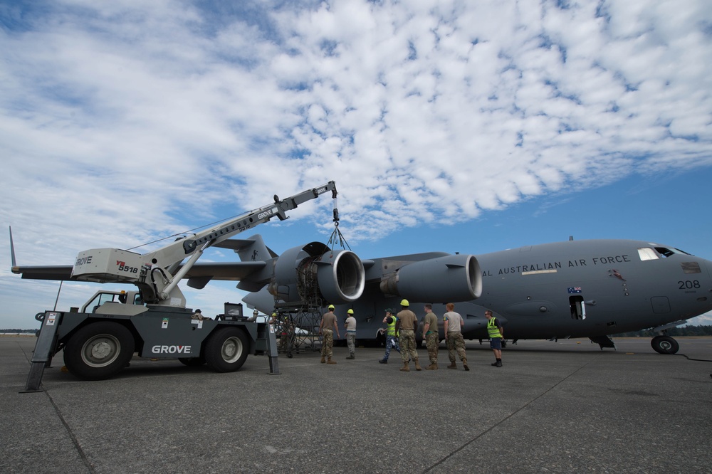 USAF Maintenance Airmen repair RAAF C-17