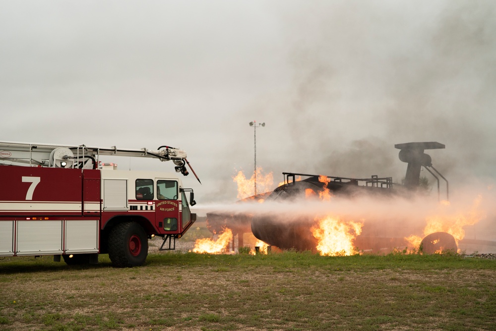 319th Civil Engineer Squadron Firefighters pair with Grand Forks International Airport Firefighters for exercise