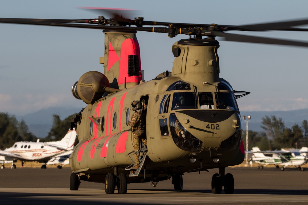 Cal Guard helicopters return from Red Bank Fire