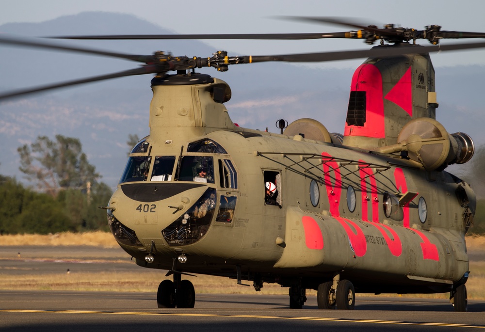 Cal Guard helicopters return from Red Bank Fire