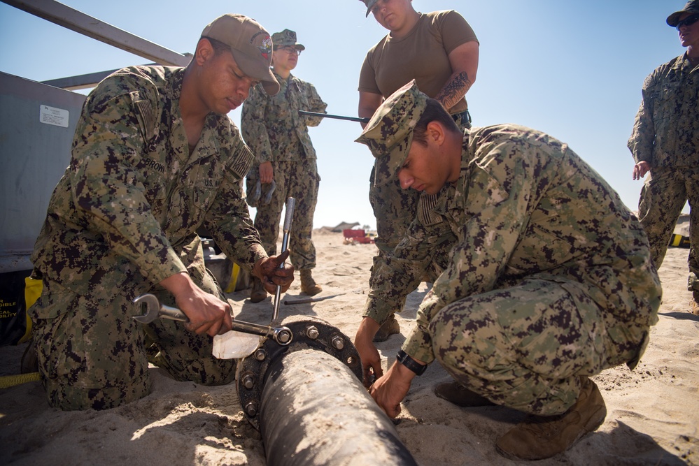 Sailors Prepare Hose for Connection to Beach Termination Unit