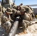 Marines Stabilize Hose for Connection to Beach Termination Unit