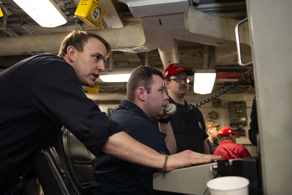 Sailors Aboard USS San Jacinto Troubleshoot a Console