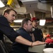 Sailors Aboard USS San Jacinto Troubleshoot a Console