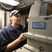 Sailros Aboard USS San Jacinto Man Aft-Steering