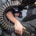 USS Normandy Sailor Performs Maintenance