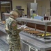 Commanding General's Summertime Competition: Capt. Amanda Cain grades Wings of Victory dining facility.
