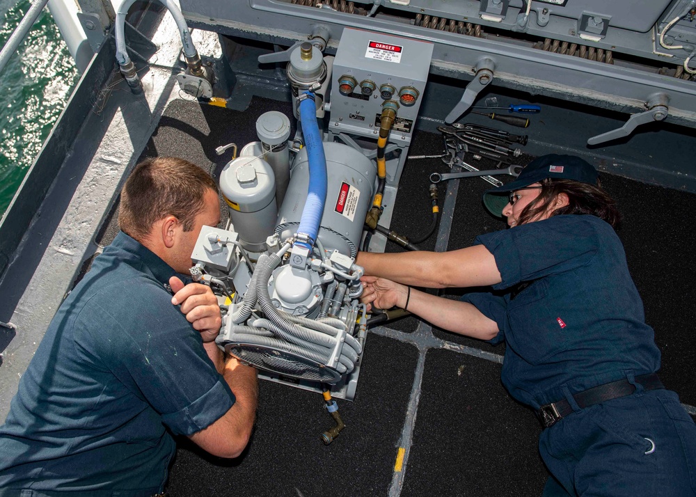 USS Normandy Sailors Conduct Maintenance