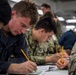 USS Makin Island holds E-5 exams.