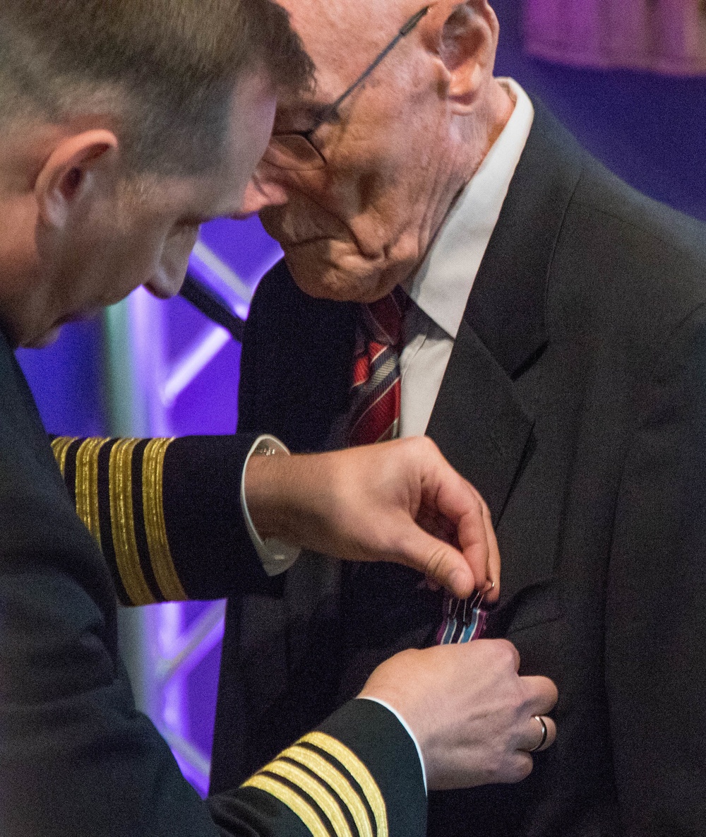 WWII Dutch civilian volunteer receives the Civilian Award for Humanitarian Service medal