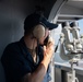 U.S. Navy Sailors stands watch aboard the aircraft carrier USS John C. Stennis