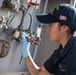 U.S. Sailor paints