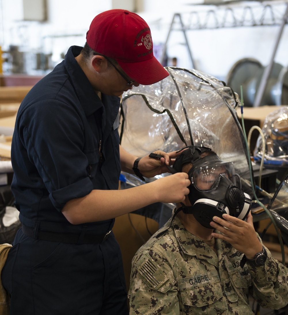 USS Theodore Roosevelt issues gas masks
