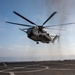 A CH-53E Sea Stallion  prepares to land aboard USS Somerset