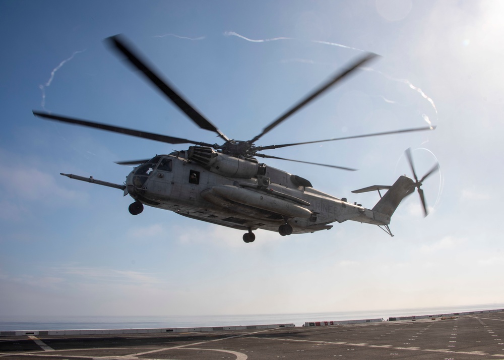 A CH-53E Sea Stallion prepares to land Aboard USS Somerset