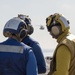 Sailors Prepare to Signal In A CH-53E Sea Stallion