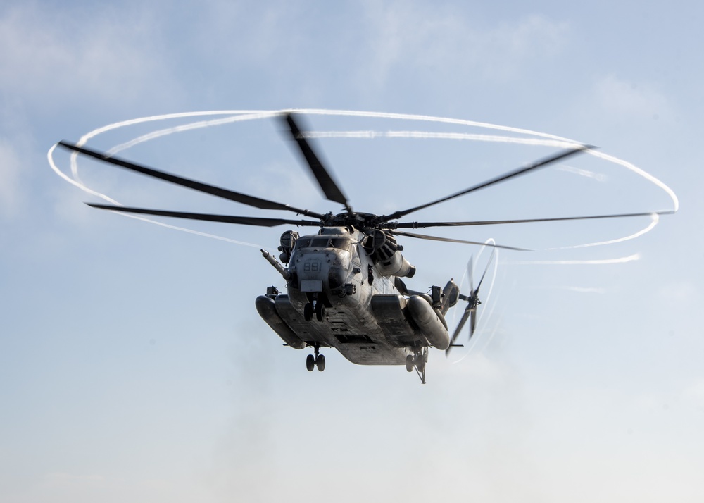 A CH-53E Sea Stallion prepares to land Aboard USS Somerset