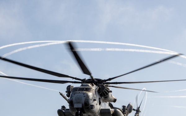 A CH-53E Sea Stallion prepares to land Aboard USS Somerset