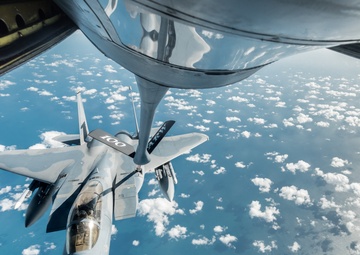 KC-135 Stratotanker refuels an F-15 Eagle during a training mission over England