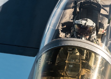 KC-135 Stratotanker refuels an F-15 Eagle during a training mission over England