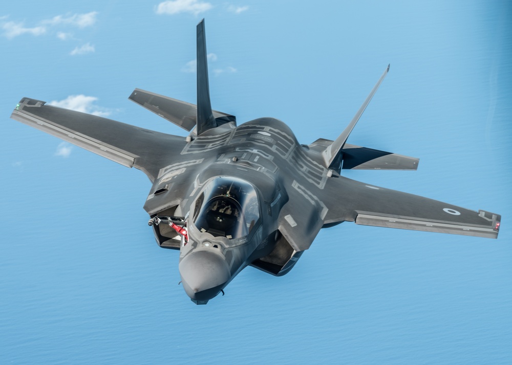 A RAF F-35 Lightning II prepares to be refueled by a KC-135 Stratotanker during a training mission over England