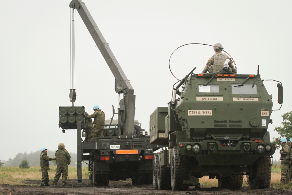 JGSDF assist U.S. Army HIMARS with ammunition reload