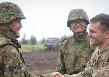 Battalion Commanders shake hands after successful planning and coordination of LFX