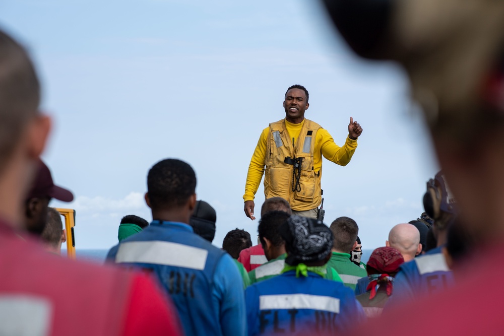 U.S. Sailors conduct a barricade drill