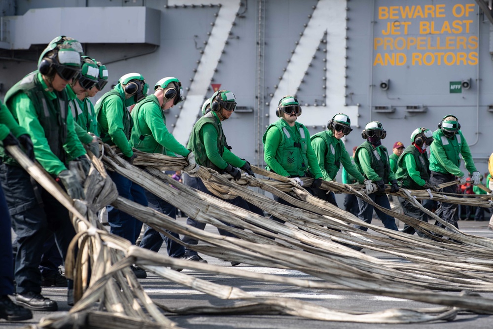 U.S. Sailors conduct a barricade drill